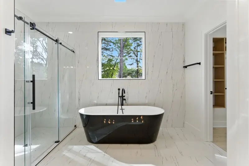 Black tub, glass shower